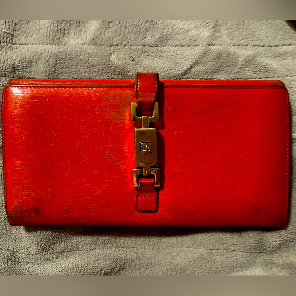 Vintage Gucci long wallet with the Jackie piston lock clasp